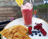 A picture of step 3 of Pineapple, blueberry, grapes, strawberry, and raspberry juice...