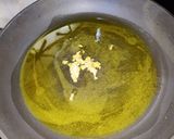 A picture of step 4 of Egg tawa masala.