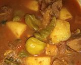 A picture of step 3 of Alou gosht.