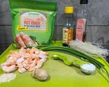 A picture of step 1 of Ebi Nira Harumaki - prawn and garlic chive rice paper packets.
