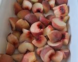Une image de l'étape 1 de Gratin de pêches plates aux amandes.
