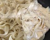 A picture of step 7 of Chicken Alfredo Pasta.