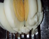 A picture of step 5 of Indomie with potato and dried fish.
