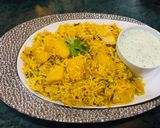 A picture of step 3 of Achari aalu pulao.