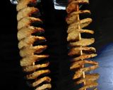 A picture of step 5 of Potato spirals.