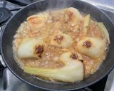 A picture of step 11 of Braised Fennel with Maple Syrup and Lemon.