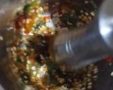A picture of step 4 of Lotus roots with mirchi.