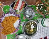 A picture of step 19 of Saag gosht with malai ki roti.