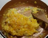 A picture of step 4 of Decent Cheese Scrambled Eggs.