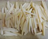 A picture of step 1 of Crispy masala fries.