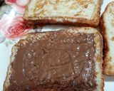 A picture of step 4 of Nutella French Toast with strawberries.