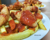 Foto del paso 7 de la receta: Fingers de pollo con patatas y salsa picantona