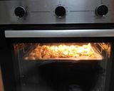 Foto del paso 6 de la receta: Lubina al horno sobre cama de cebolla, papas y tomates cherry