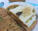 A picture of step 6 of Simple Omelet with Lacha Paratha n Tea.