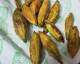 A picture of step 2 of Onion Stuffed Karela.