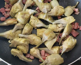 Foto del paso 3 de la receta: Alcachofas salteadas con jamón