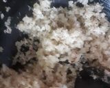 A picture of step 2 of Surul /churul appam (coconut crepe roll).