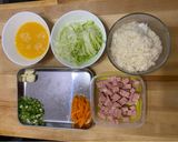 A picture of step 1 of Fried rice with spam, egg and lettuce.