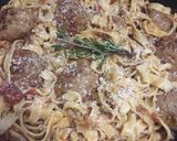 A picture of step 5 of Pork and beef meatballs in a slow braised tomato sauce and pasta.