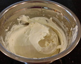 A picture of step 10 of Mocha Layer Cake with Whipped Mascarpone Cream and a Coffee Glaze Drizzle.