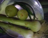 A picture of step 1 of Spring Onions And Amla ki Chutney.