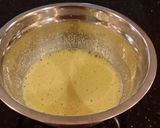 A picture of step 7 of Patriotic Vanilla Cake Roll with Whipped White Chocolate Ganache Filling and Frosting.