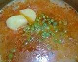 A picture of step 7 of Aloo Matar Gosht.