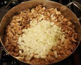 A picture of step 4 of Sausage and Mushroom Pasta in a Parmesan Cream.