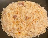 A picture of step 1 of Garlic Fried Rice with Sunny-Side-Up Eggs.