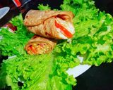 A picture of step 4 of Tikka Paratha Roll.