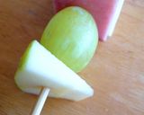 A picture of step 5 of Fruit, Cheese, and Ham Sandwich Skewers.