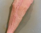 A picture of step 1 of Monkfish meunière with leek green and lemon juice.