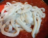 A picture of step 5 of Calamari stewed in Tomatoes.