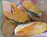 A picture of step 1 of Bhetki machher paturi/ Barramundi cooked in banana leaves.