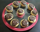 A picture of step 5 of Vanilla cup cakes with chocolate frosting.