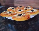 صورة لخطوة 7 من وصفة ميني بيتزا 🍕