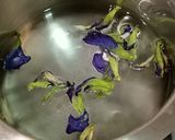 A picture of step 1 of Butterfly Pea Flower Healthy Lemon Rice.