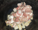 Foto del paso 2 de la receta: Arroz con chuleta de cerdo y maíz tierno