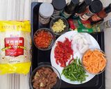 A picture of step 1 of Singapore noodles/ rice sticks.