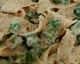A picture of step 11 of Pappadelle Pasta with Asparagus, Saffron + Peas.