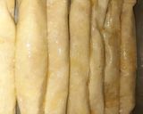 A picture of step 4 of Walnuts baklawa served with cream.