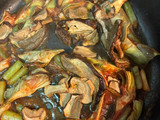 Arroz de secreto ibérico con boletus y alcachofas