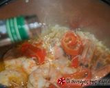 A picture of step 3 of Shrimps saganaki.