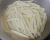 Foto del paso 7 de la receta: Solomillo de cerdo a la plancha con setas al ajillo y papas fritas