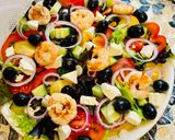 A picture of step 6 of Greek salad with shrimps.