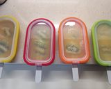 Foto del paso 4 de la receta: Polos de naranja y kiwi en moldes Lékué
