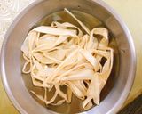 A picture of step 2 of Kanpyo - simmered gourd for sushi roll.