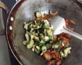 A picture of step 3 of Bittergourd tomato dry curry.