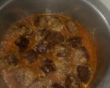 A picture of step 9 of Cheesy meatballs in sauce.