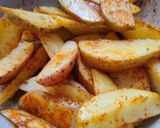 Foto del paso 2 de la receta: Hamburguesa de atún al curry con patatas gajo al horno